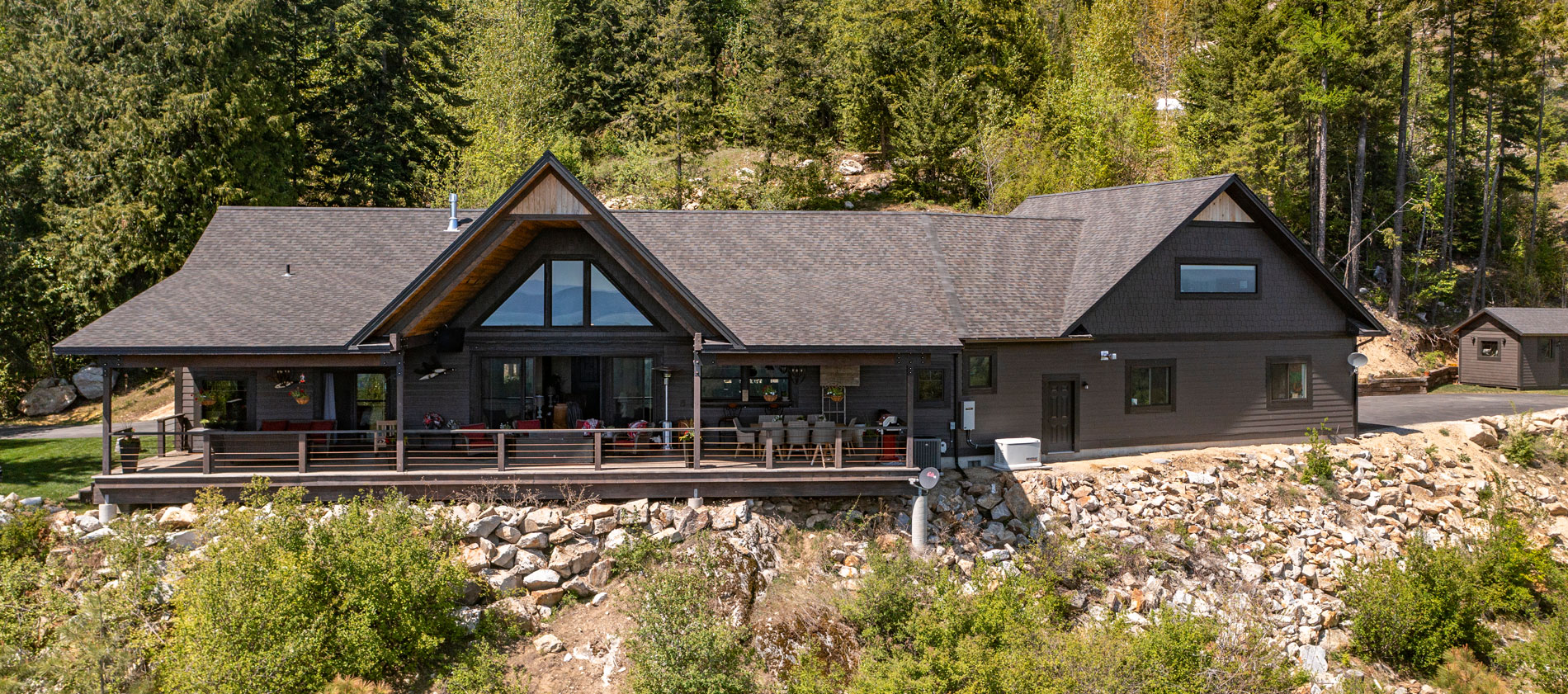 Gorgeous home tucked privately in the trees at the base of Schweitzer Mountain. Meticulously designed and constructed estate property offers unmatched views of Lake Pend Oreille and the Cabinet Mountains