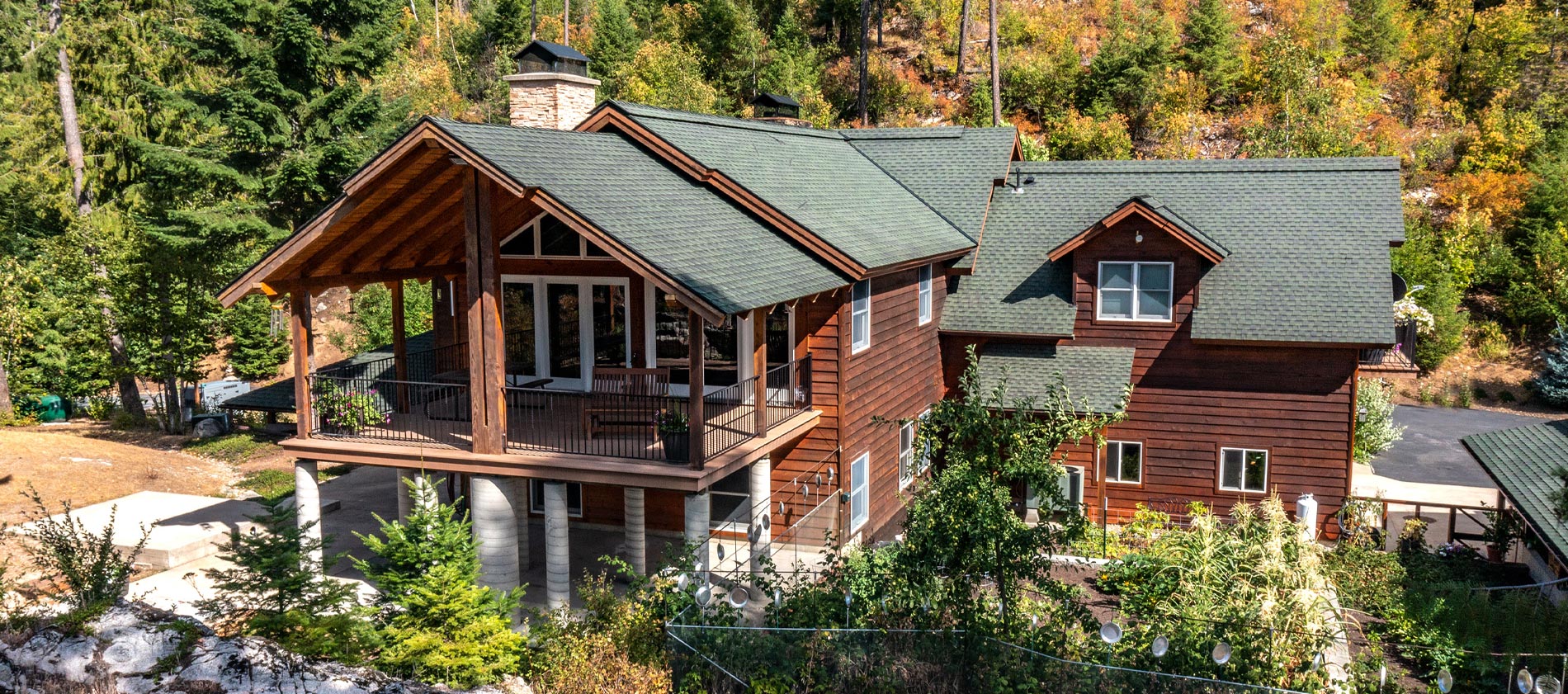 One-of-a-kind custom home on 13 acres (2 separate lots) overlooking the pristine waters of Priest Lake