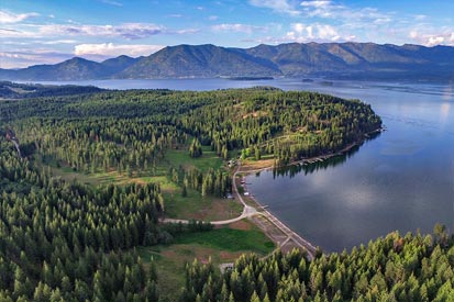 Camp Bay with the Cabinet Mountain Range in the background