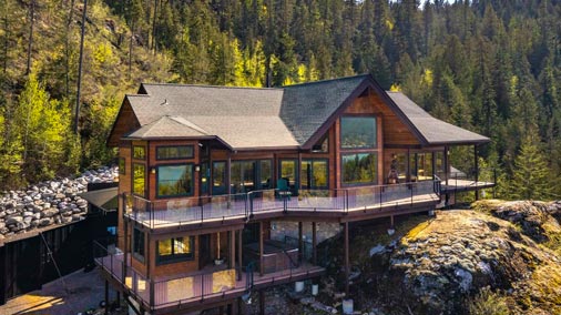 Nestled on two lots with stunning views of the Pend Oreille River